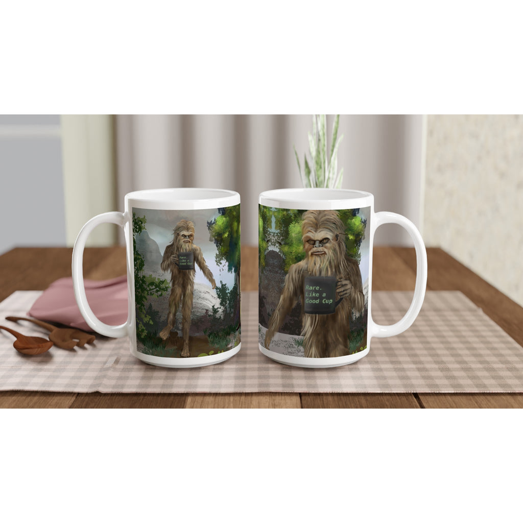 Premium white ceramic - Big Foot Mug- Rare. Like a Good Cup 15 oz size - Shows Big foot holding mug deep in the forest - right view & left view