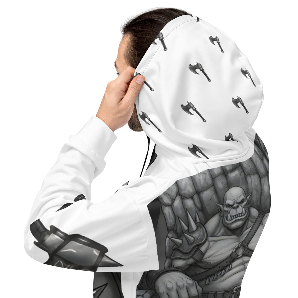 Man wearing Coffee Warrior Orc Unisex Hoodie - Funny Before Coffee Hoodie-All over print - Black and white- Fierce Orc Warrior sitting in favorite chair holding a mug of coffee - hood has axes printed in a pattern. Pocket and sleeves has an axe. - back right view
