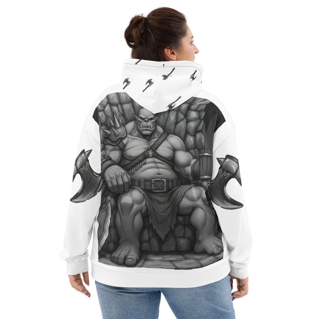 Woman wearing Coffee Warrior Orc Unisex Hoodie - Funny Before Coffee Hoodie-All over print - Black and white- Fierce Orc Warrior sitting in favorite chair holding a coffee mug - hood has axes printed in a pattern. Pocket and sleeves has an axe. - back view