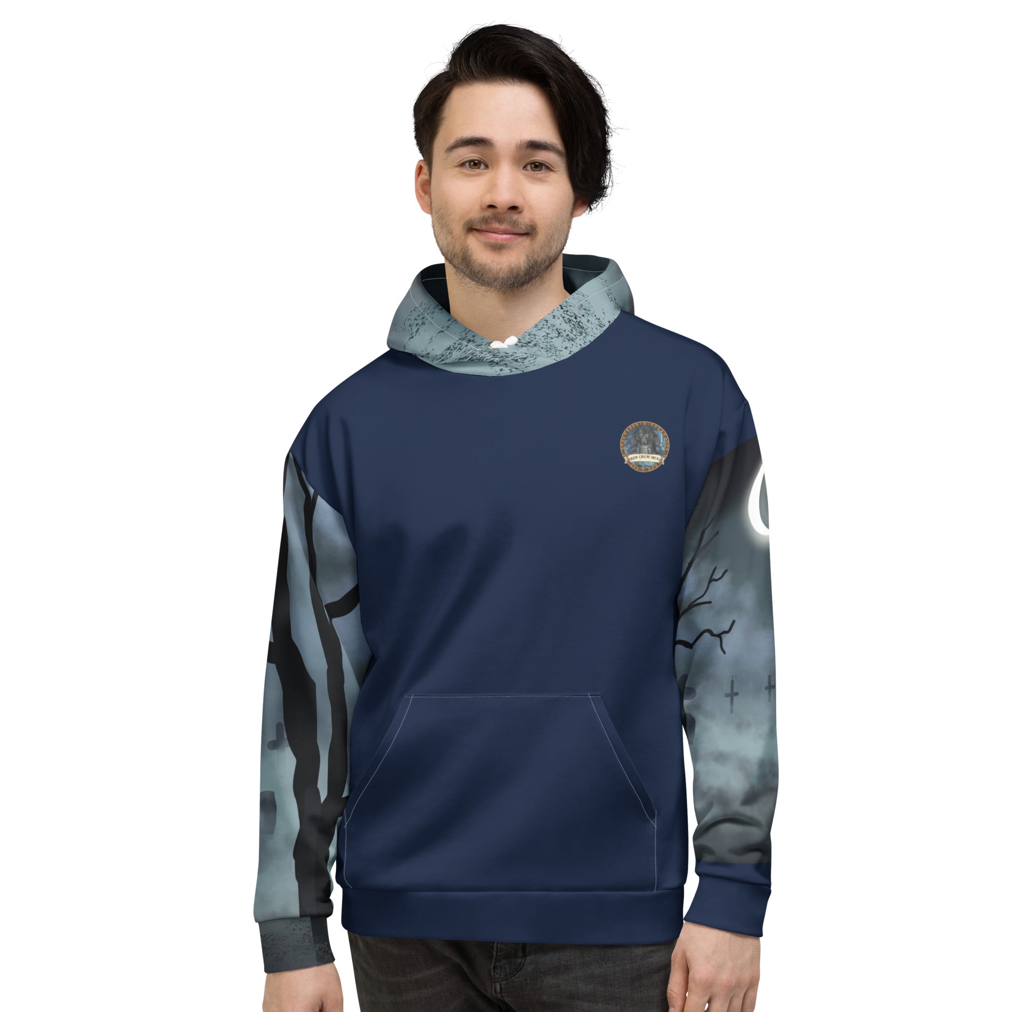 At The Monster Café Brew Crew Hoodie — front view, navy unisex hoodie with Brew Crew Mugs logo on left chest, gothic graveyard all-over print on sleeves and hood with crescent moon
