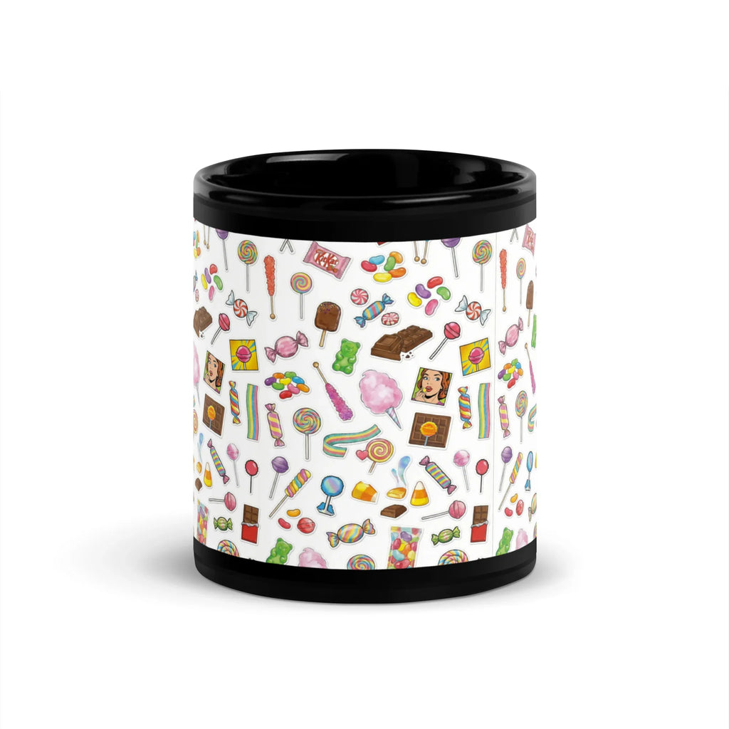 Black glossy ceramic mug with colorful candy and sweets pattern on white background.