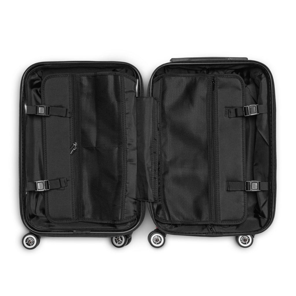 Interior of Monster Brew hard-shell suitcase showing black lining, mesh pockets, and compression straps