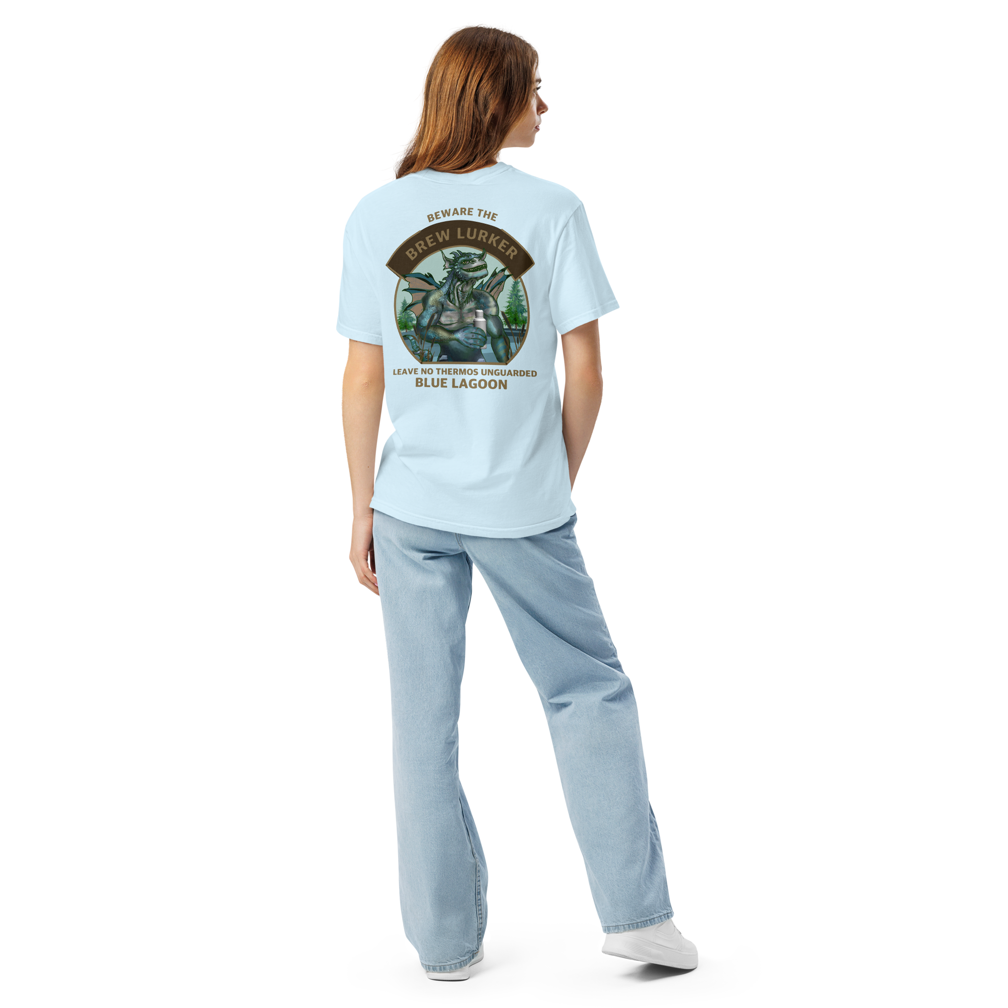 Girl wearing a light blue t-shirt with a Brew Lurker design on the back, standing against a white background.