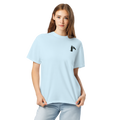 Woman wearing a light blue t-shirt with a graphic of claw and coffee thermos