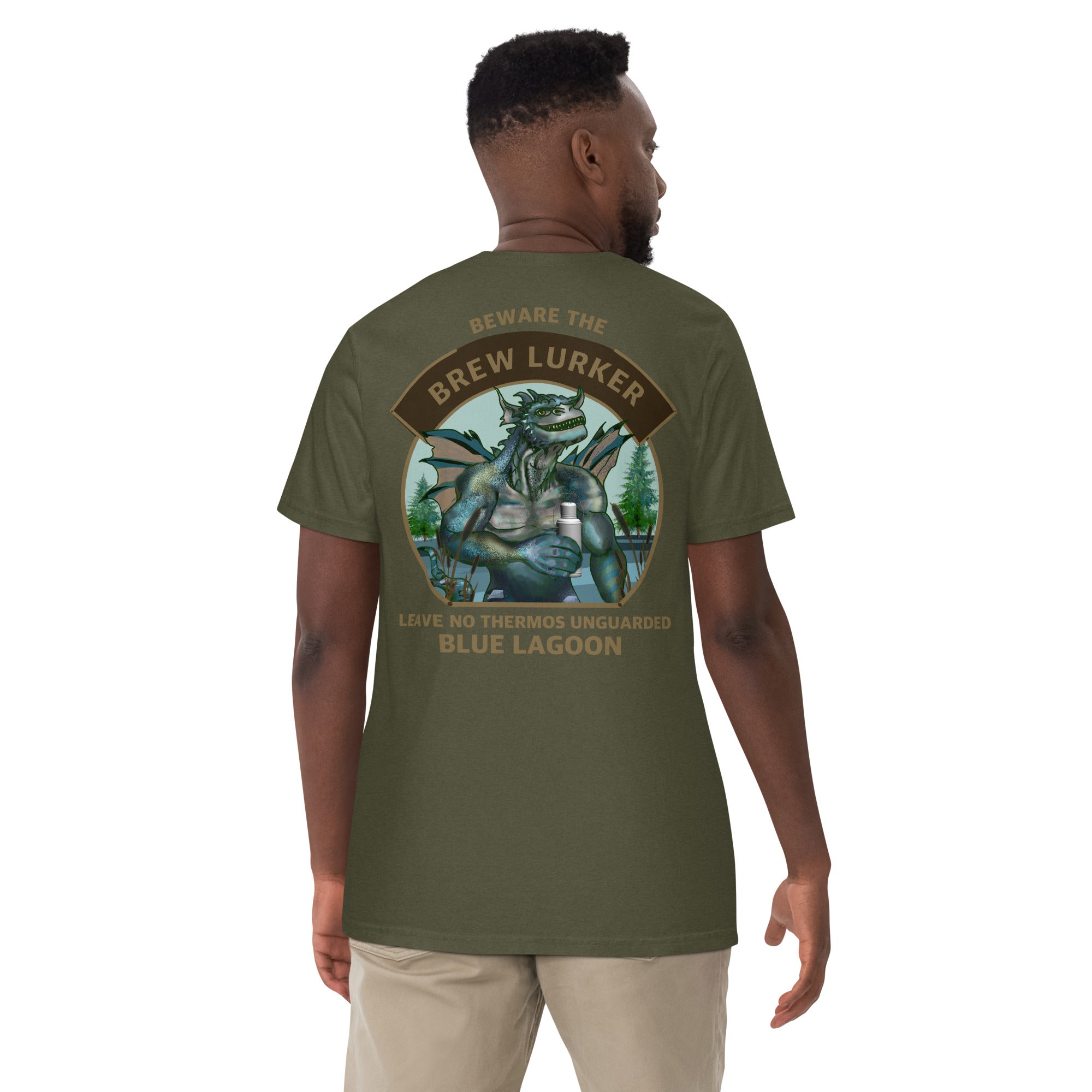 Person wearing a sage t-shirt with a Brew Lurker graphic design on the back, set against a white background.