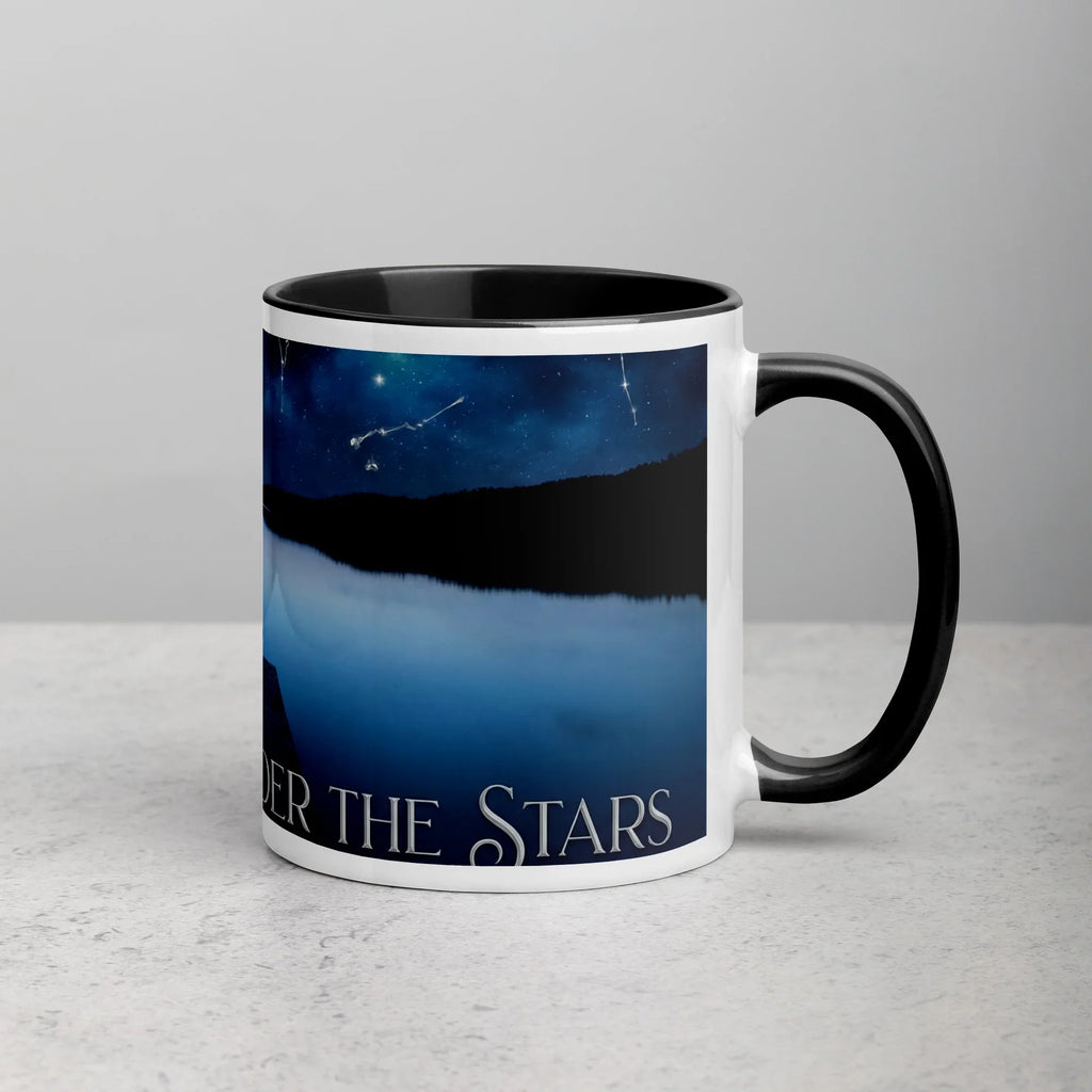 White ceramic mug with black handle and rim, night sky and stars lake design