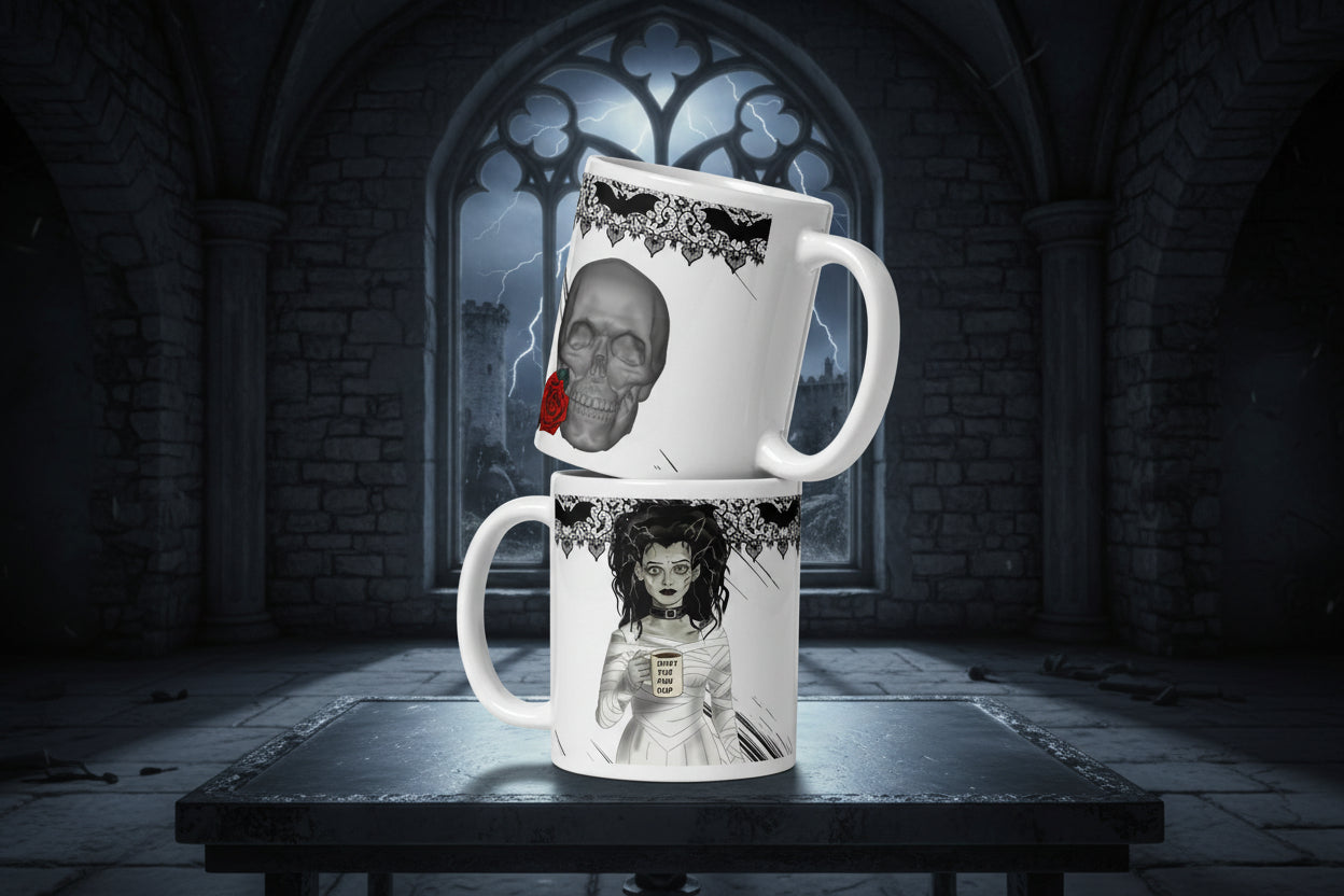 Shut the Fuh Cup Mug - Bride of Frankenstein Coffee Gothic | Brew Crew- Premium white ceramic mug -right view- skull with red rose and gothic bat lace on top rim
Left view- Frankenstein's monsters bride wearing a white dress made of bandages, and a black choker - her hair is disheveled  and with her blank stare she holds her coffee mug with text "shut the fuh cup" written. Gothic bat lace on top rim - 11 oz mug view