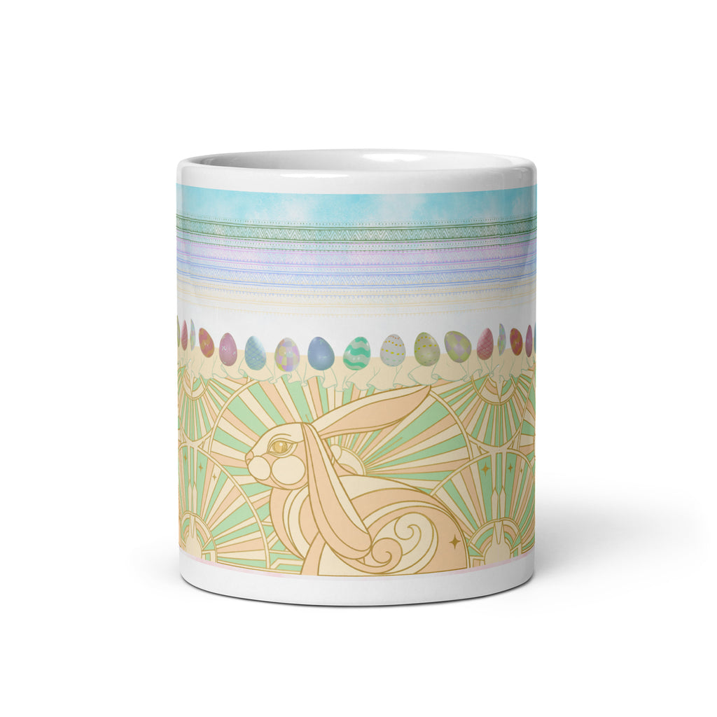 Premium white ceramic - Art Deco Easter bunny mug - Art Deco golden bunny with geometric sunburst pattern
Row of watercolor Easter eggs in pastel pink, blue, green, and lavender
 - 11 oz front view