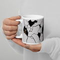 Premium white ceramic - cracked wall design- Mouseterious mug - black and white with mouse peeking through hole in wall - 11 oz left view