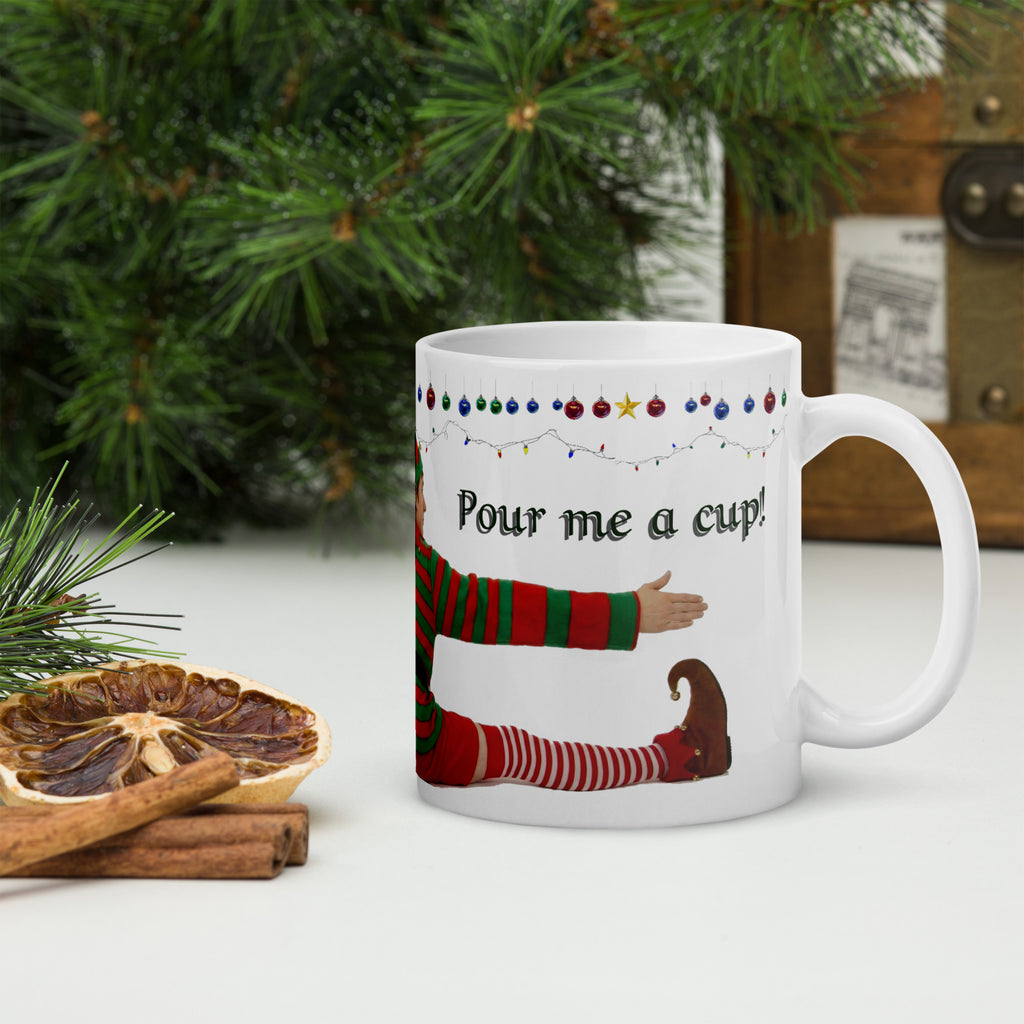 Premium white ceramic - Don't be Elfish - Pour me a cup! - Coffee mug - features cheeky elf dressed in holiday colors hugging the mug with colorful ornaments border at the top- 11 oz right view