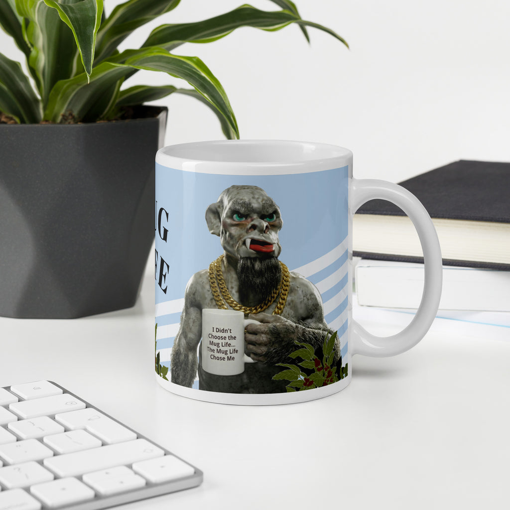 Premium white ceramic mug  features a muscular orc living his best Mug Life! With his gold chain bling, plants, and a confident stance, this green-skinned coffee lover knows what's up. The text reads "I didn't choose the Mug Life... The Mug Life Chose Me 11 oz right view