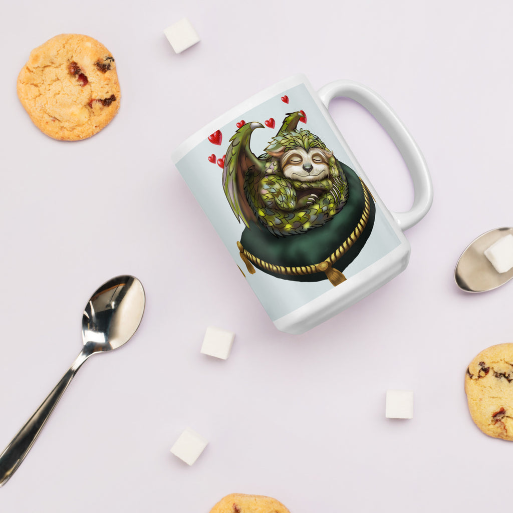 Sleepy Sloth Dragon mug on table with cookies - sleeping dragon curled on velvet pillow - 15 oz right view