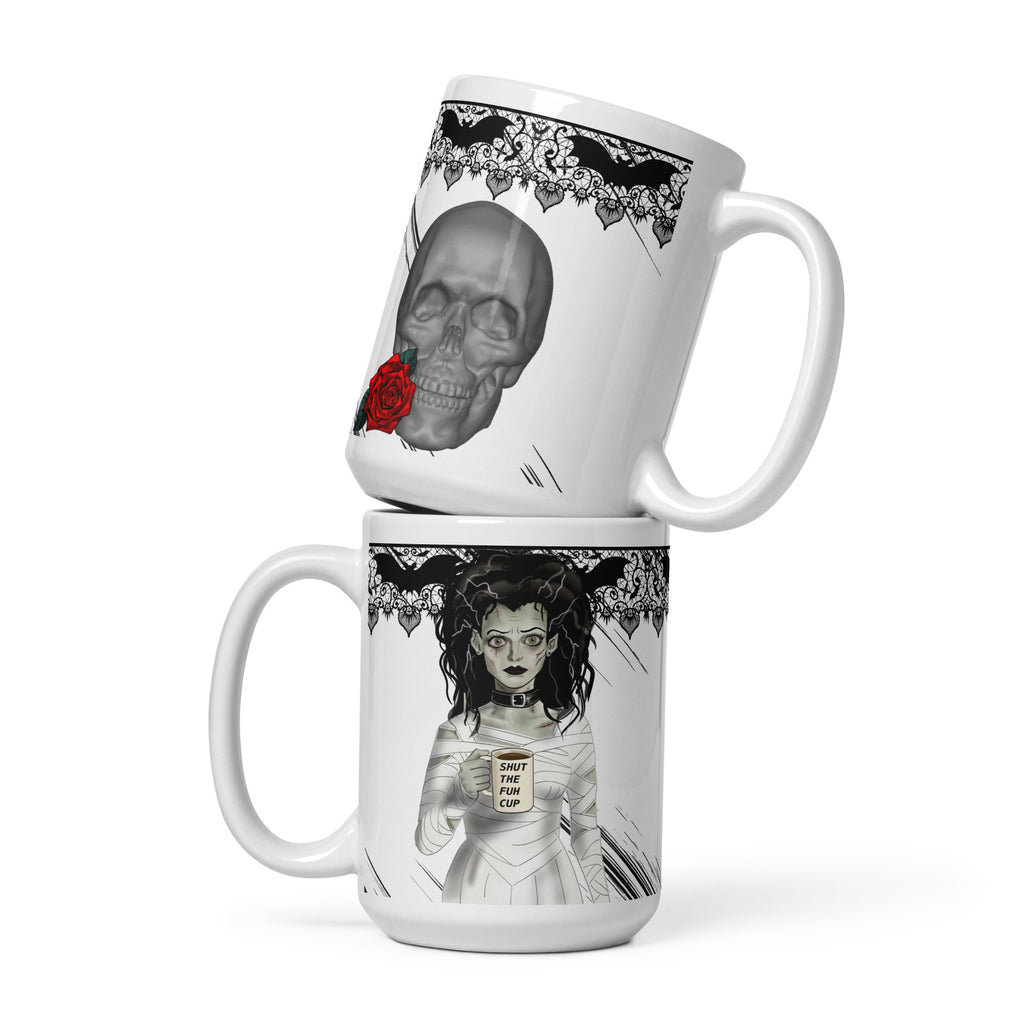 Shut the Fuh Cup Mug - Bride of Frankenstein Coffee Gothic | Brew Crew- Premium white ceramic mug -right view- skull with red rose and gothic bat lace on top rim
Left view- Frankenstein's monsters bride wearing a white dress made of bandages, and a black choker - her hair is disheveled  and with her blank stare she holds her coffee mug with text "shut the fuh cup" written. Gothic bat lace on top rim - 15 oz mug view