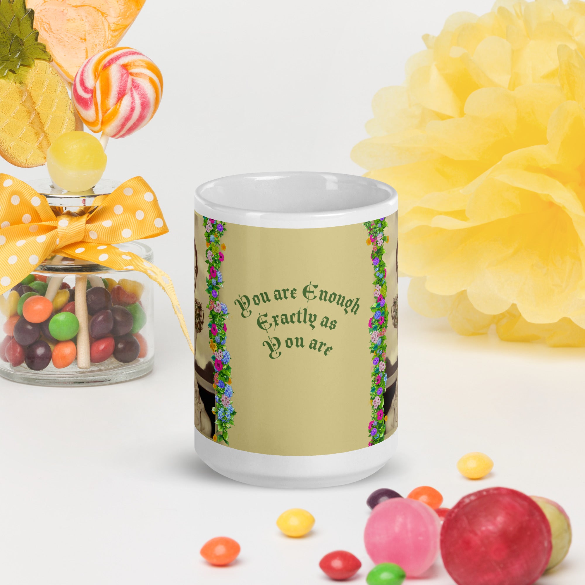 Beautiful Premium white ceramic mug features a vintage sepia-toned woman with flowing hair, holding an ornate decorative mug, framed by colorful floral garlands. With the empowering message "You are Enough Exactly as You are" -15 - oz front view