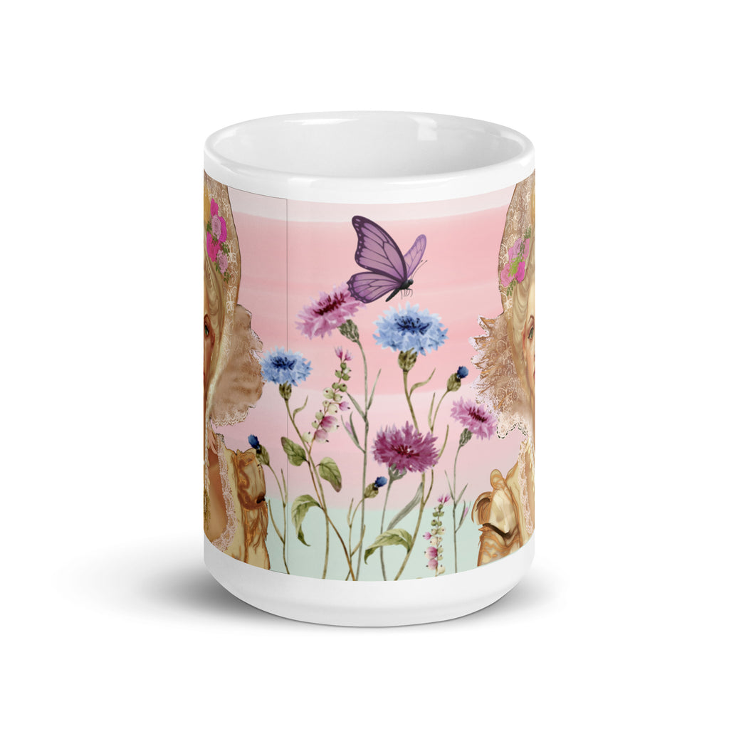 Stunning Premium white ceramic mug features the iconic French queen Marie Antoinette with her elaborate updo hairstyle, ornate golden crown adorned with pink flowers, magnificent white lace Elizabethan collar, and pearl necklaces. Surrounded by her beloved cornflowers (bleuets) and a delicate purple butterfly - 15 - oz  front view