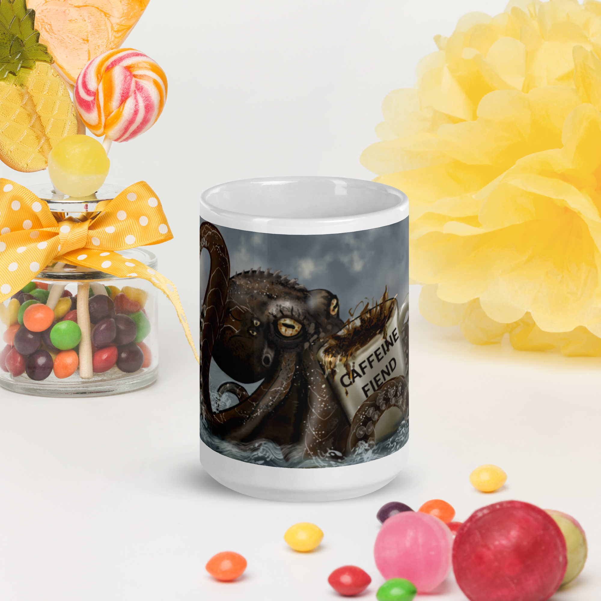 Cup with octopus design and 'Caffeine Fiend' text, surrounded by colorful candies and flowers. 15 oz front view