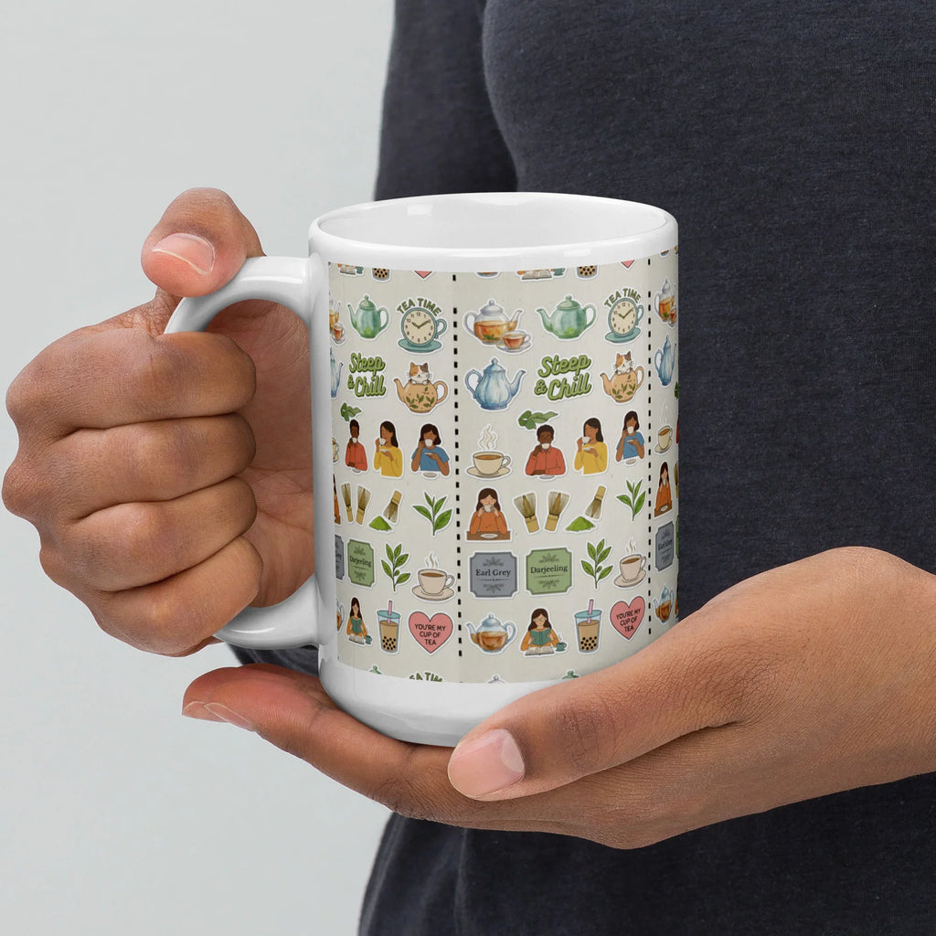 Person holding white ceramic mug with colorful tea-themed nature motifs and calming illustrations
