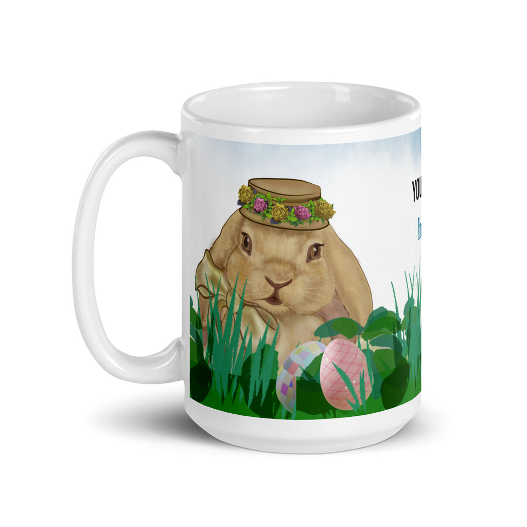 Spring Bunny Lady Mug Easter Coffee Mug with charming spring bunny adorned with a delicate flower crown hat in field of grass, light blue sky and Easter eggs. Customize with text in all sizes - 15 oz - left view