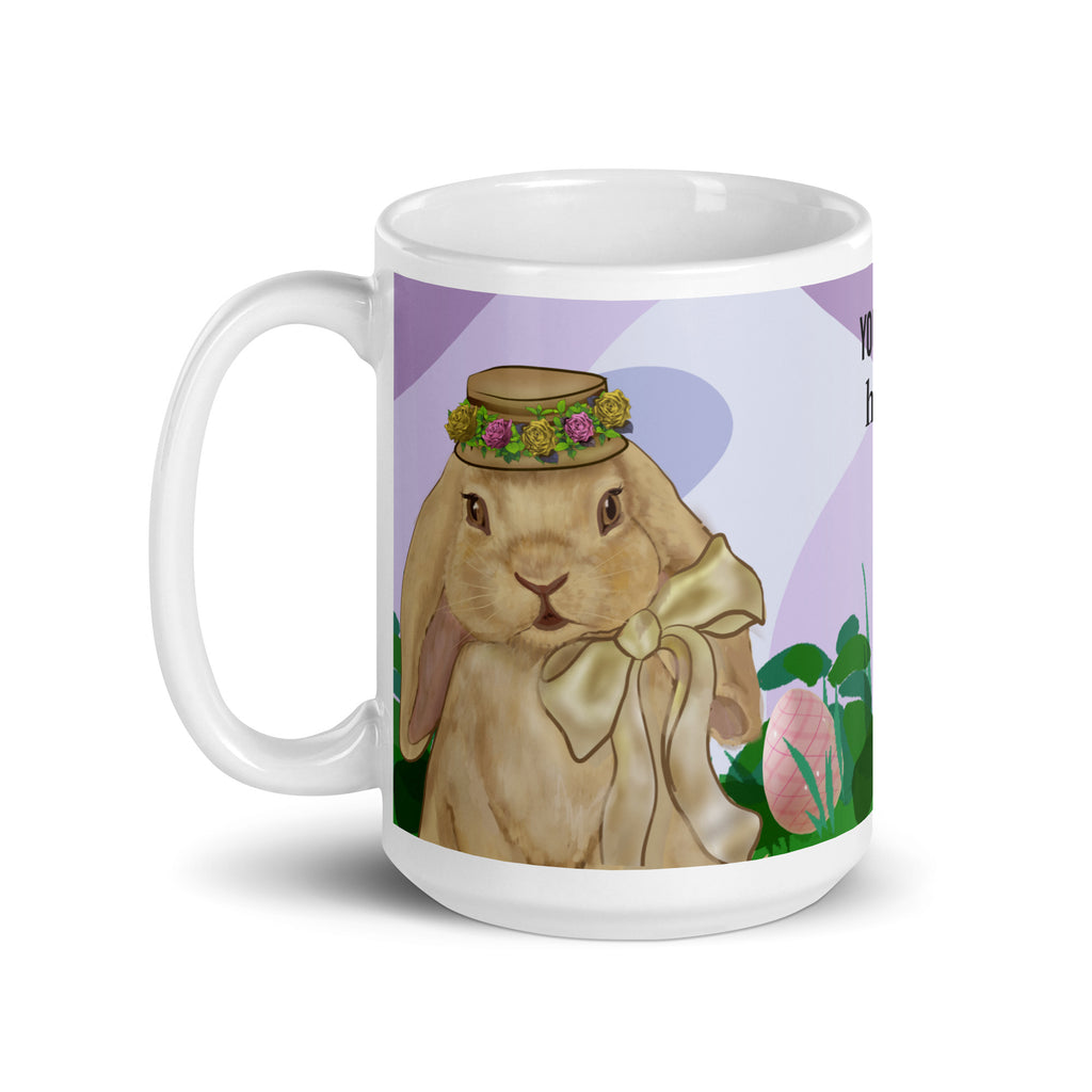 Spring Bunny Lady Mug Easter Coffee Mug with charming spring bunny adorned with a delicate flower crown hat in field of grass, lavender pattern background and Easter eggs. Customize with text in all sizes - 15 oz - left view