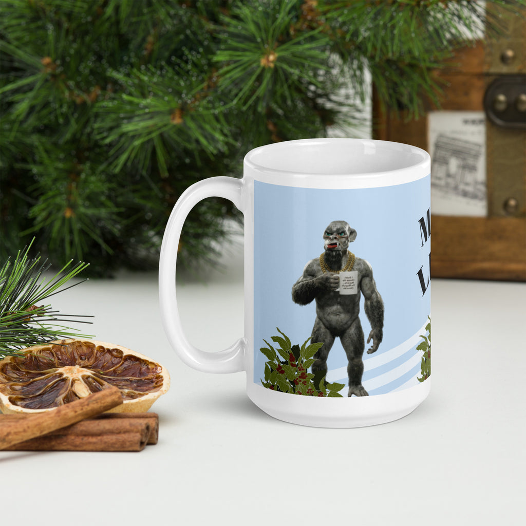 Premium white ceramic mug  features a muscular orc living his best Mug Life! With his gold chain bling, plants, and a confident stance, this green-skinned coffee lover knows what's up. The text reads "I didn't choose the Mug Life... The Mug Life Chose Me 15 oz left view