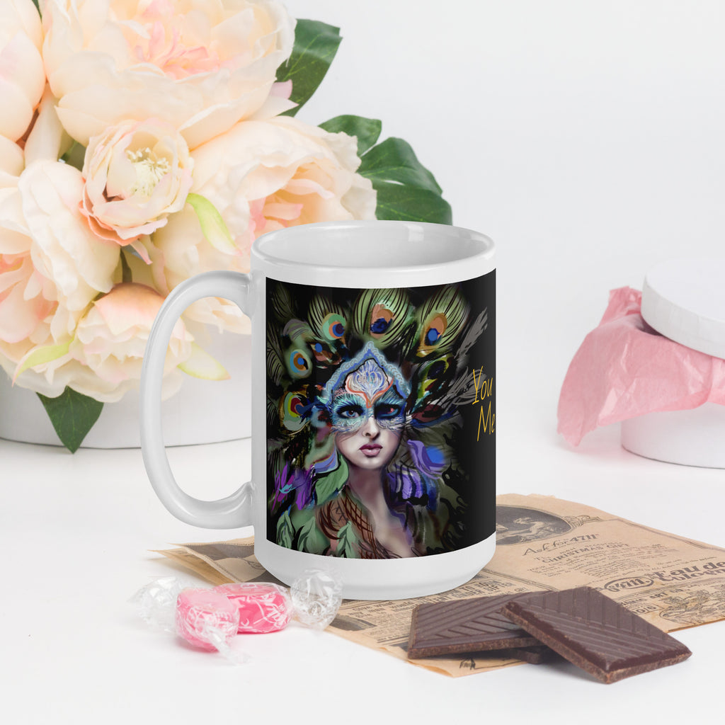 Stunning Premium white ceramic mug features a majestic woman adorned with vibrant peacock feathers, ornate blue and orange face paint, and a regal purple and green costume. With the inspiring message "You Are Majesty, 15- oz left view