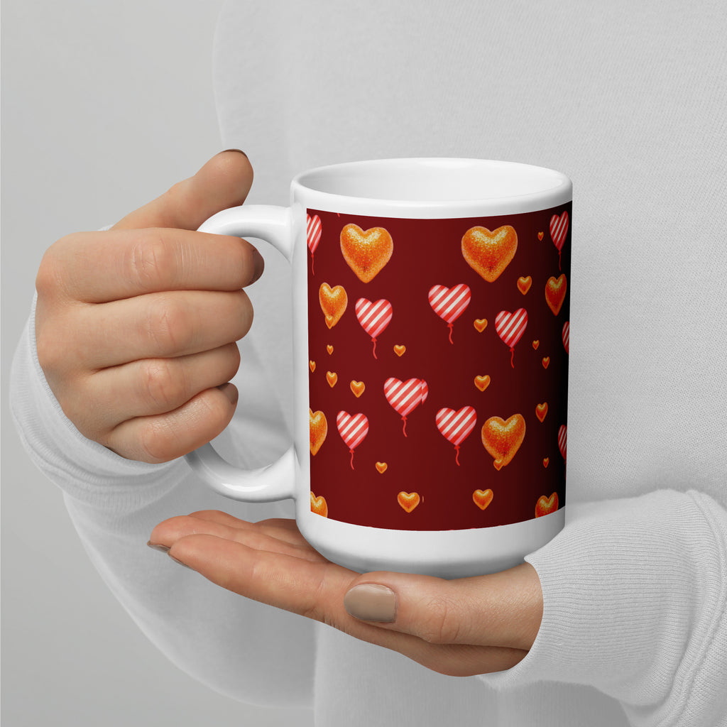 Premium Ceramic Beautiful heart balloons Valentine mug held in persons hand -with burgundy background! Watercolor hearts and striped heart balloons - perfect for romantic gifts and love celebrations - 20 oz - left view