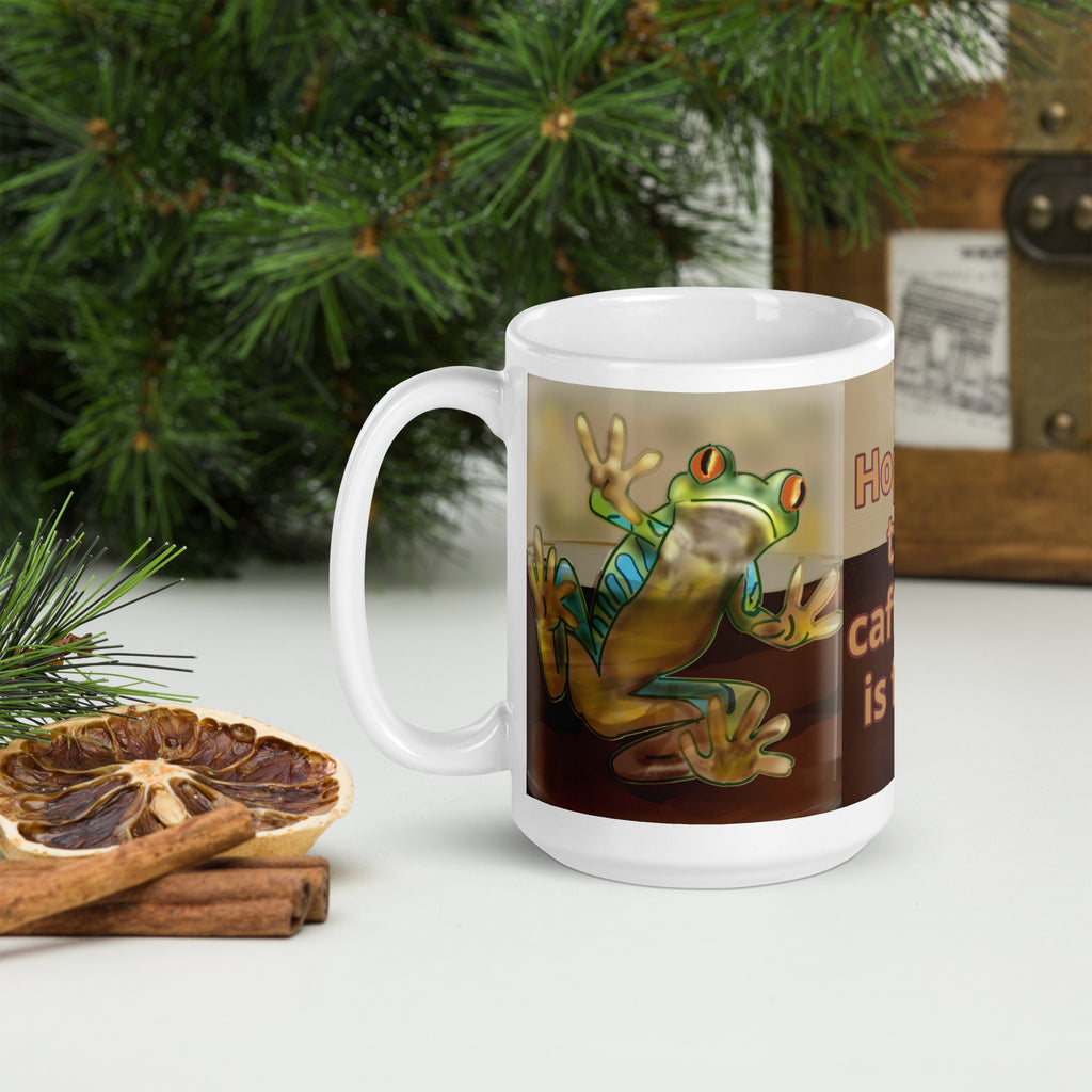 Premium white ceramic - Hop in, the caffeine is fine! text on coffee mug- features a bright green and blue tree frog peeking through the coffee with bright orange eyes - 15 oz left view