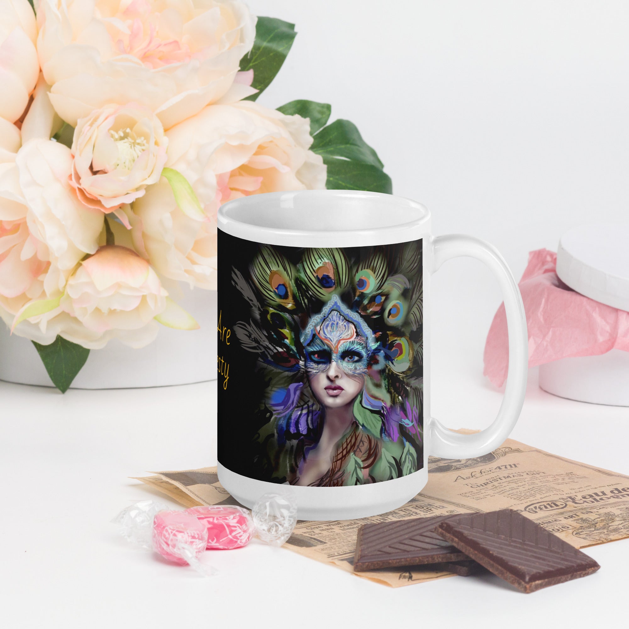 Stunning Premium white ceramic mug features a majestic woman adorned with vibrant peacock feathers, ornate blue and orange face paint, and a regal purple and green costume. With the inspiring message "You Are Majesty, 15- oz right view