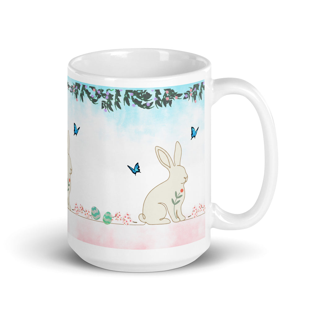 Premium White Ceramic - Bunny and Butterfly Mug -Eucalyptus and floral garland border at top-Gentle cream-colored bunny in peaceful garden setting with Blue butterflies fluttering around the scene
- 15 oz right view