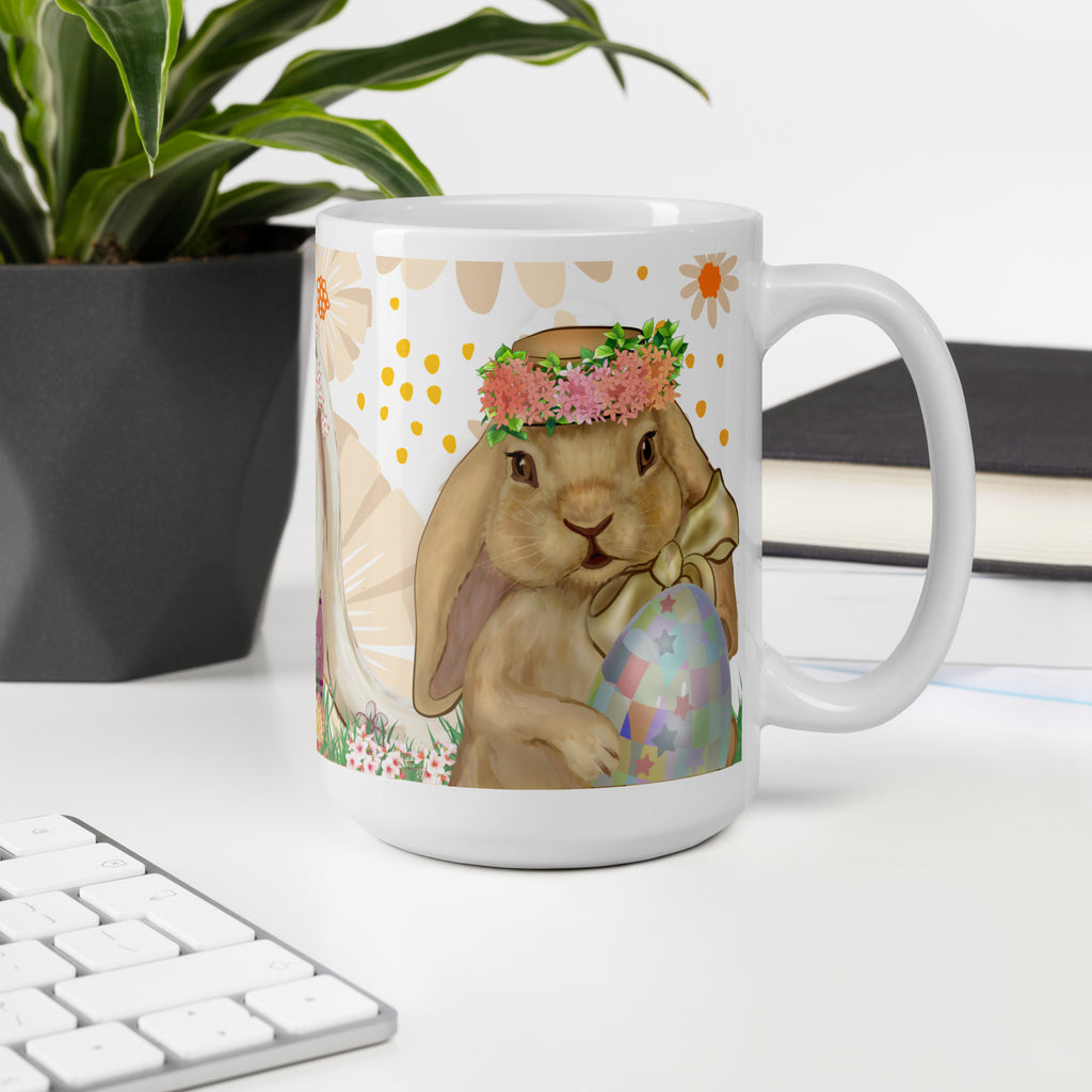 Easter Bunny Trio Premium ceramic Mug - Whimsical Spring Ceramic Gift - Adorable Spring Lady  bunny with floral crown hat proudly holding a blue easter egg on a a floral water color style background-  painting  - 15 oz - right view - on office table