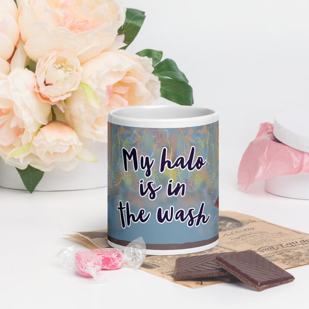 My Halo is in the Wash - Fallen Angel Premium Ceramic Coffee Mug - Inspired by classical renaissance painting of the fallen angels - cherubs holding coffee mugs - words "My halo is in the wash" 20- oz front view