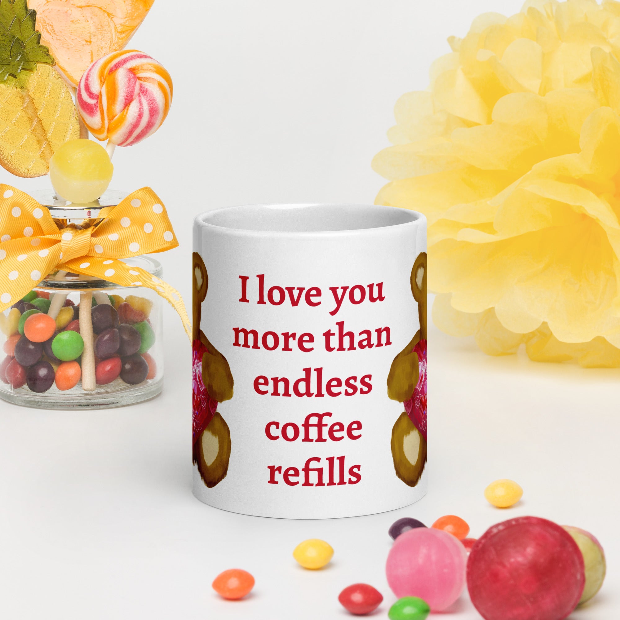 Premium White Ceramic mug - held in persons hand on a table with party decorations and colored candy - Valentines Day Bear with geometric Pink and red heart coffee mug.- Personalized text -  20 oz - front view