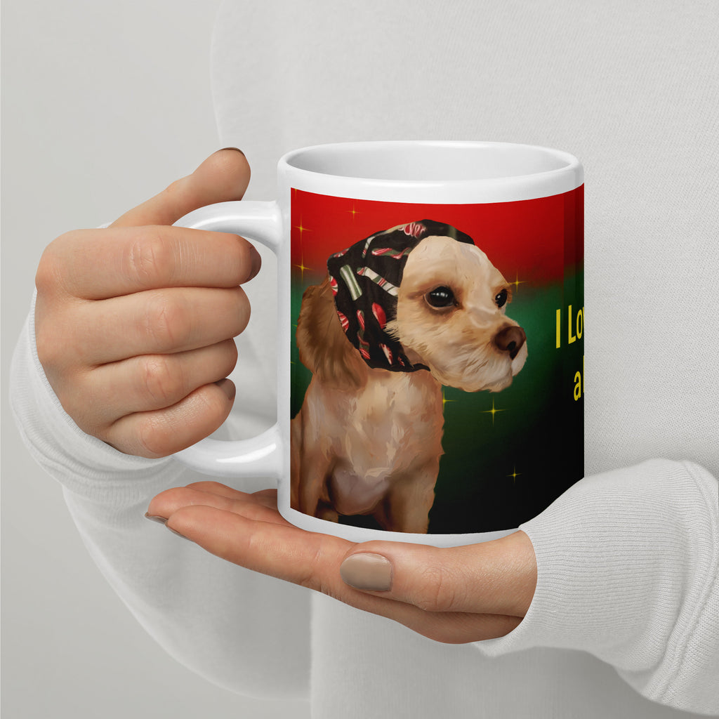 Adorable Premium white ceramic mug features the sweetest tan pup with big soulful brown eyes, wearing a festive black bandana decorated with Christmas motifs. Set against a beautiful red to green gradient background with sparkles - 20 - oz left view