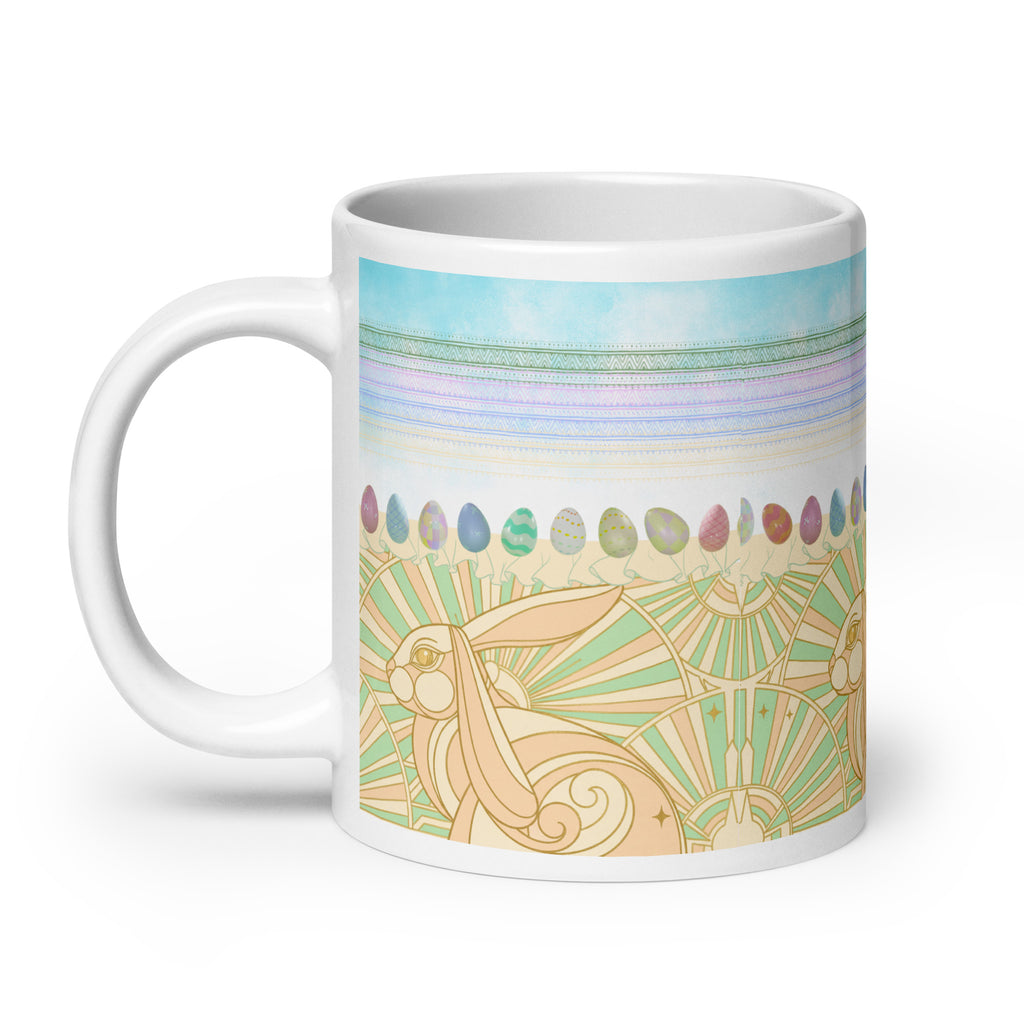 Premium white ceramic - Art Deco Easter bunny mug - Art Deco golden bunny with geometric sunburst pattern
Row of watercolor Easter eggs in pastel pink, blue, green, and lavender
 - 20 oz left view