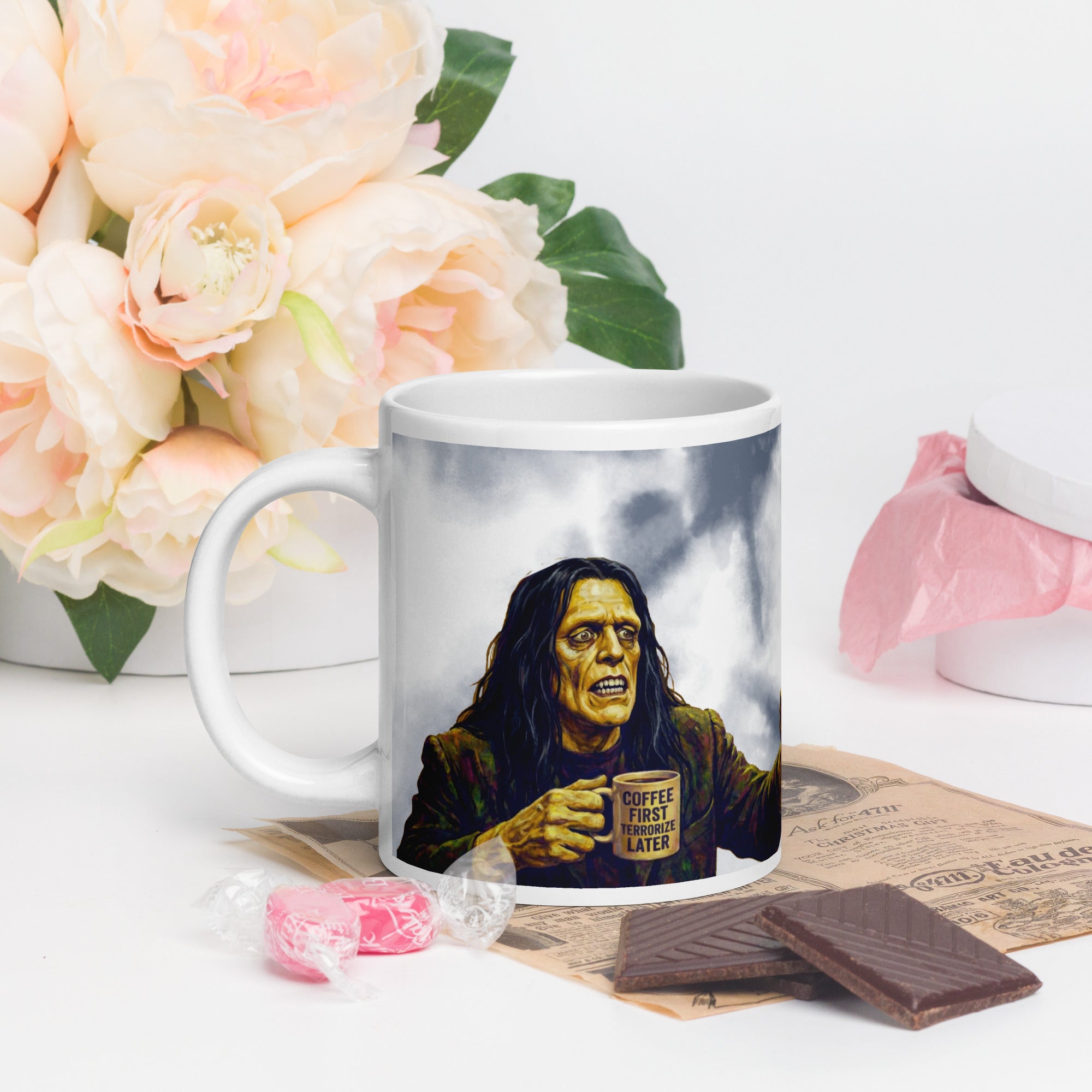 Premium white ceramic -Frankenstein & Bride Coffee Mug - Made for Each Other, Mostly for Coffee - shows Frankenstein's monster fearful holding a mug that has " Coffee First...Terrorize Later" 20 oz left view