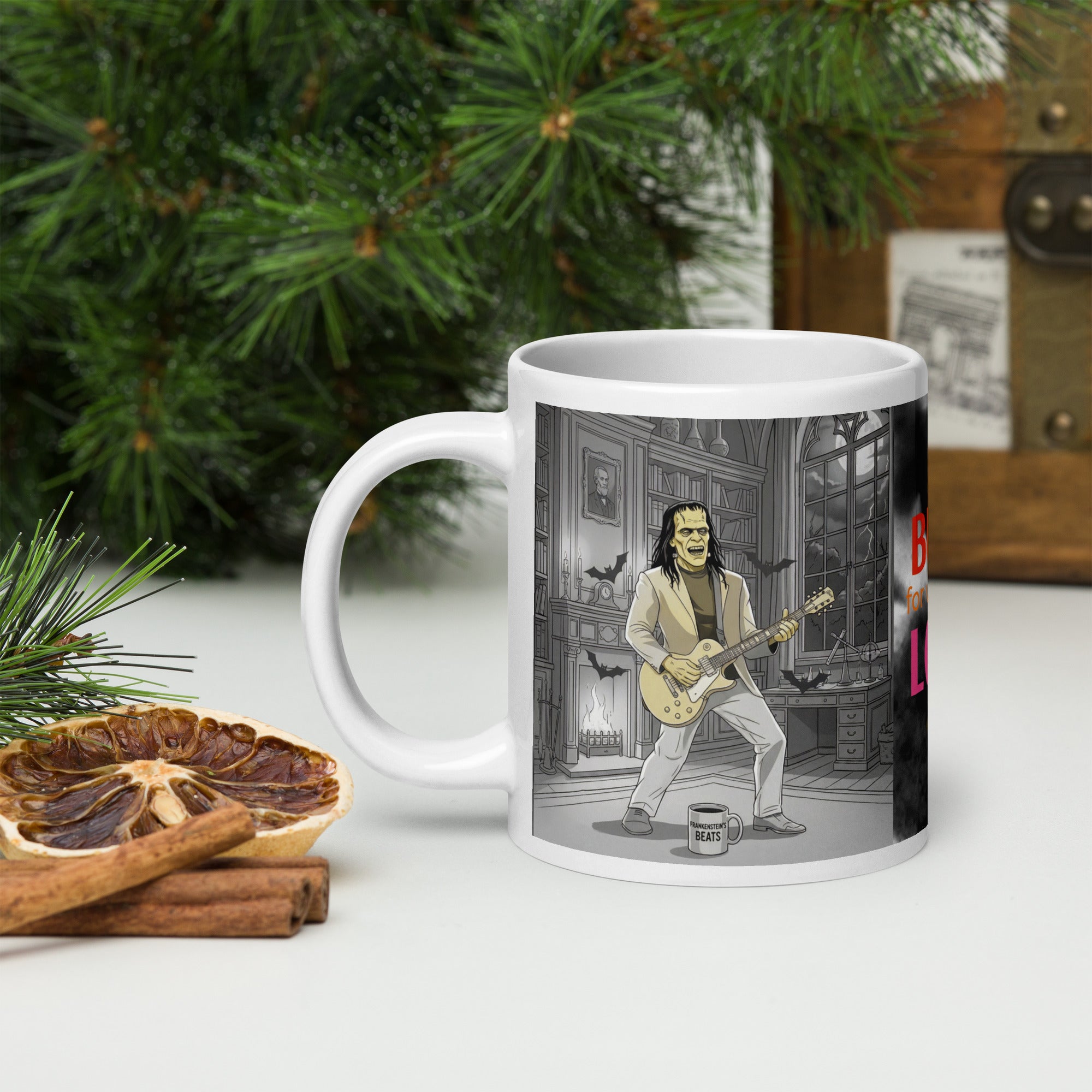 Brew-kenstein Coffee Monster | Burn for What You Love …Premium ceramic mug-Monster playing guitar with bats fying around - mug on floor with words "Frankenstein's Beats" written on front- 20 oz left view