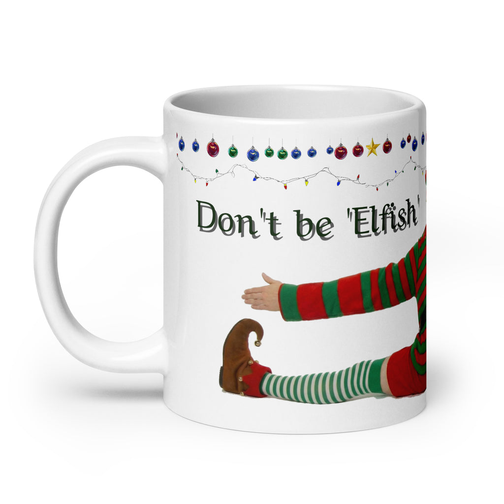 Premium white ceramic - Don't be Elfish - Pour me a cup! - Coffee mug - features cheeky elf dressed in holiday colors hugging the mug with colorful ornaments border at the top- 20 oz left view