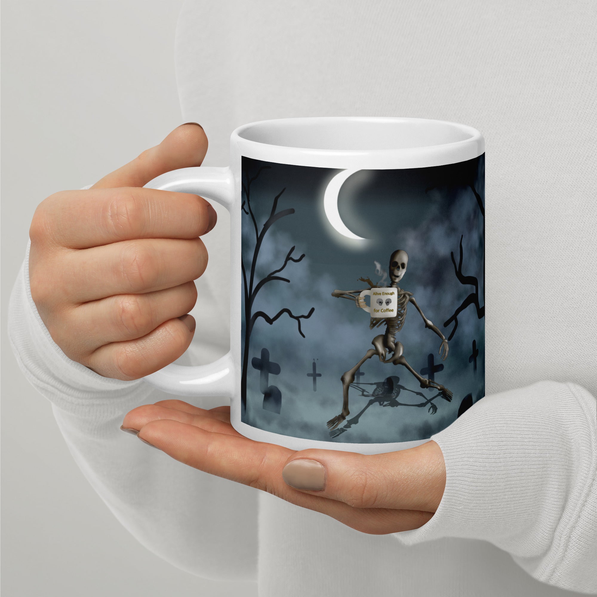Premium white glossy ceramic mug -  Alive Enough for  Coffee - dancing skeleton holding coffee mug - graveyard scene under crescent moon 20 oz left view