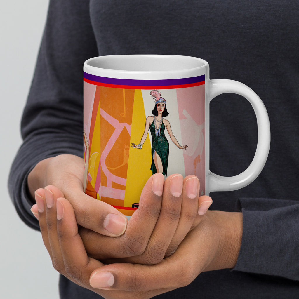 Premium white ceramic -1920's Flapper Mug -Ornate feathered headpiece and classic 1920s bob hairstyle -Elegant flapper in emerald green sequined gown -Bold Art Deco geometric background in warm oranges, yellows, and pinks
Red, purple, and blue decorative border bands -Captures the glamour and freedom of the Jazz Age
20 oz right view