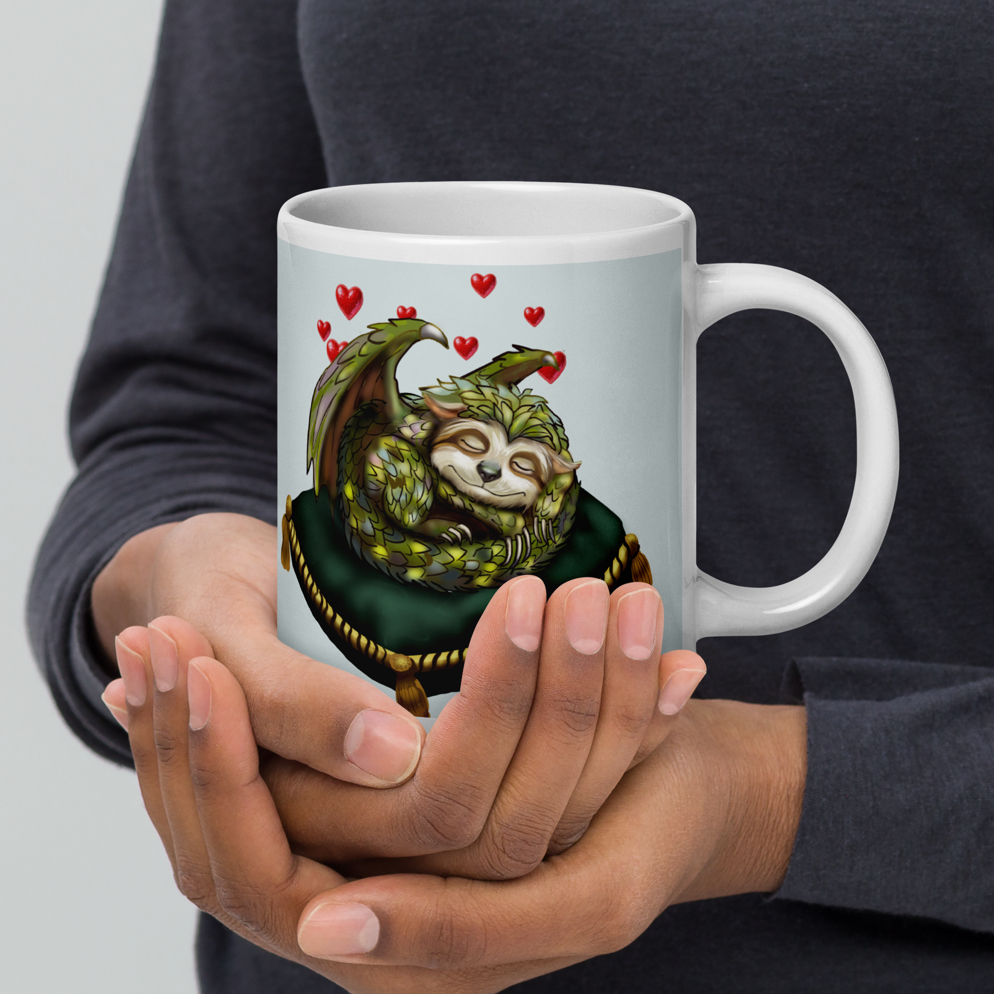 Sleepy Sloth Dragon mug - sleeping dragon curled on velvet pillow held in persons hand 20 oz right view

